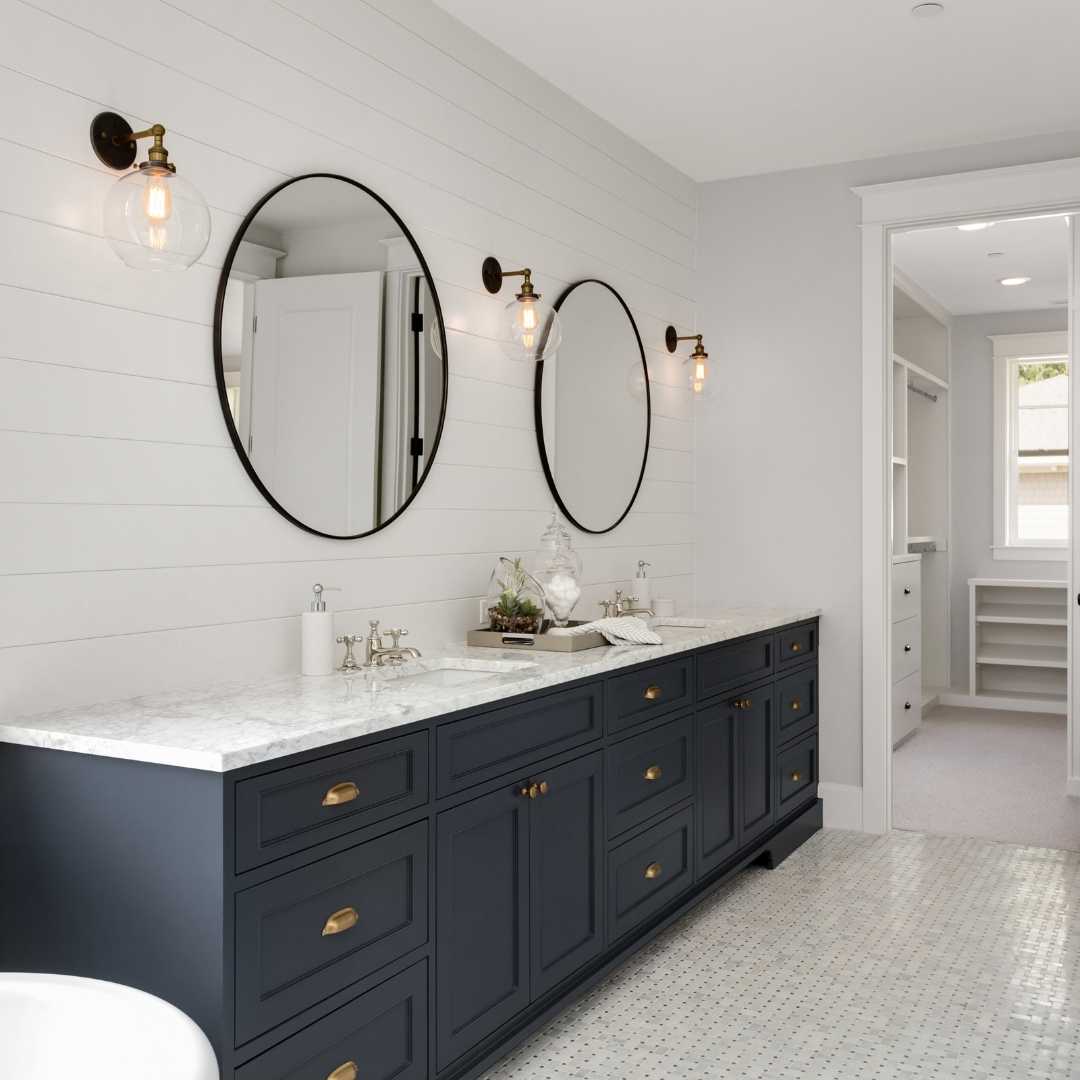 White bathroom with traditional yet modern accents.